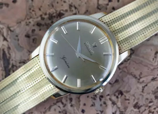 Omega 14702 Geneve Dress Watch Automatic Papers 1966 orig. Goldbracelet photo 1